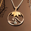 Signature Wave Pendant with 18K Sun & Blue Topaz